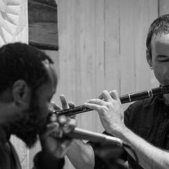 Cyber Trad: A musical experiment that combines melodic sensibilities from traditional Irish and Breton music, and blends them with rhythmic elements of contemporary Quebecois, funk, and Hip Hop. 