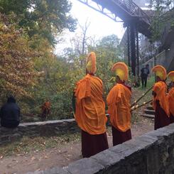 Emissary: Shodekeh, board member of the Asian Arts & Culture Center of Towson University, with the Tibetan Monks of the Drepung Loseling Monastery, 2016. 