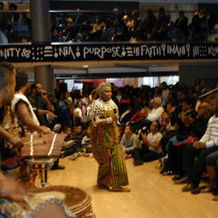 Kwanzaa Celebration with Founder of Kwanzaa Dr. Maulana Karenga @ The Reginald F. Lewis Museum, with musical guests Sankofa Dance Theater & Shodekeh. Photo by the Baltimore Sun, 2013.