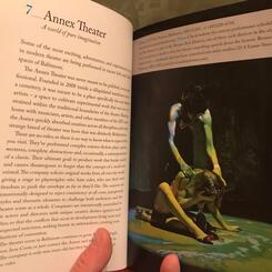 Photo of Breaud and Columbus in a Visit Baltimore Guidebook