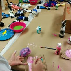 Children Painting Hand Puppet Heads They Designed and Built