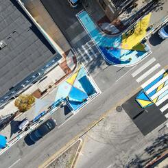 Design for Distancing Curbside Commons aerial view midblock crosswalk