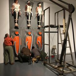 Stack 2016 , vinyl, felt, canvas, thread, steel, wood, hardware, 6 human subjects, 160x192x18” and 36x72x80”