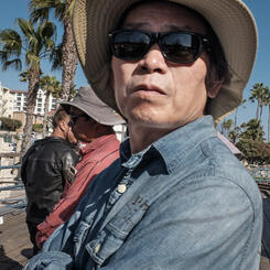 The palm trees sway.