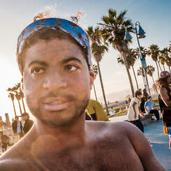 A triple threat.  Singer, Rapper, Skater.