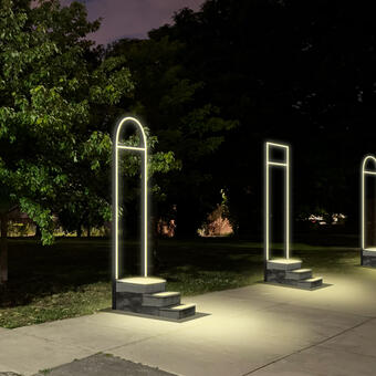 Ghost Stoops public art installation of glowing doorways and front stoops installed on the site of missing, demolished rowhouses in Baltimore