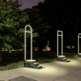 Ghost Stoops public art installation of glowing doorways and front stoops installed on the site of missing, demolished rowhouses in Baltimore