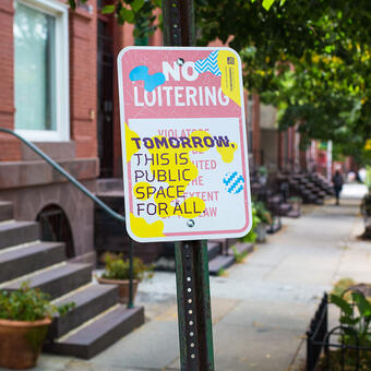 Tomorrow, this is public space for all. A disrupted No Loitering sign public art piece