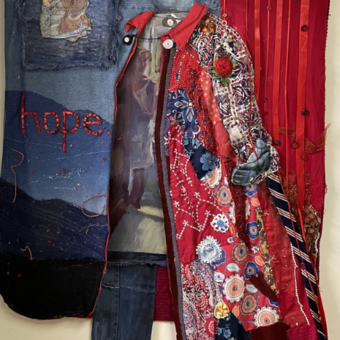 standing figure with red and blue background