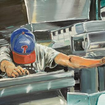 A man collapses in a sigh behind a counter