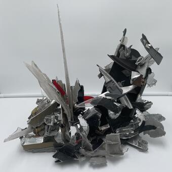 Sculpture made from broken car pieces