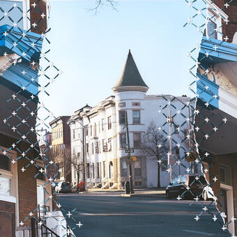 Torn photographs of Baltimore combined together using sashiko embroidery