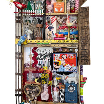 Narrative found object assemblage wall-relief sculpture, 40 x 21 x 5, reflecting on my life, featuring transistor radio, Westie sculpture, model train tracks, a heart filled with buttons, fountain, birds, beaded flowers, Popeye paint set, jacks, stenciled crate board, measuring tape, Oscar Mayer wiener truck whistle, Cracker Jack box, etc. , 