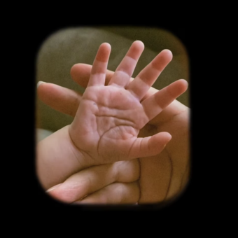 "what it felt like"still frame. My baby and my hands together. 