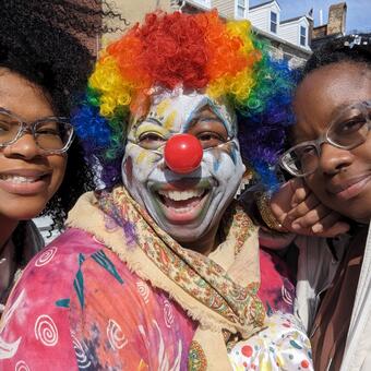 Sheila as the clown with daughter and Director, Nia Hampton