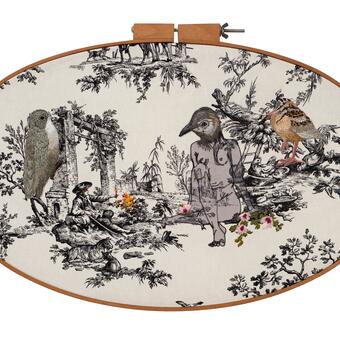 Freemotion and Hand embroidered Mockingbird headed figure has a conversation with a man in the toile fabric that is starting hand embroidered fire in the toile bushes while blindfolded. He is framed by a hand embroidered chimney sweep and a woodcock. 