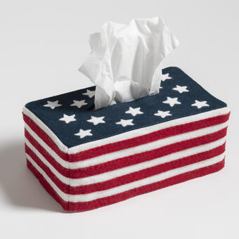 Kleenex box covered USA flag made out of wool felt, one kleenex pulled out of the box.