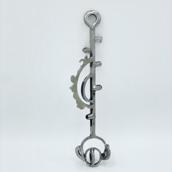 Steel key-shaped sculpture