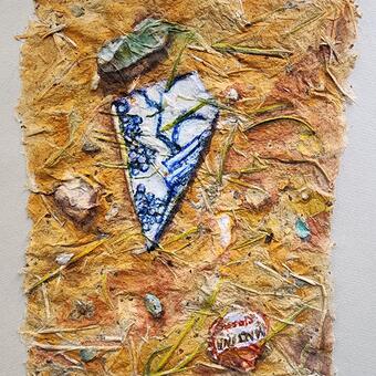 Watercolor painting on hand-made paper, made from black mulberry bark and scraps of an old love note. This painting is very highly textured with some of the pulp of the tree and small bits of the written note visible in the paper. The image is of a fragment of "Blue Willow"-like pattern china, a bottle cap from a Mexican soda, rocks and pebbles. 