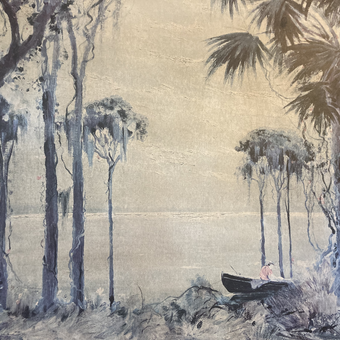 This is a lithograph in mostly cream and green-grays, depicting a shoreline, waterline, and sky framed by tall palm trees with Spanish moss dripping from the limbs. Near the shoreline, slightly to the right of center, a small rowboat rests in the water. In the boat is a fisherman wearing a very faded red shirt.
