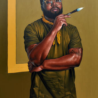 Man holding a paintbrush