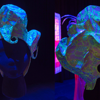 A wearable sculpture that resembles a wig.