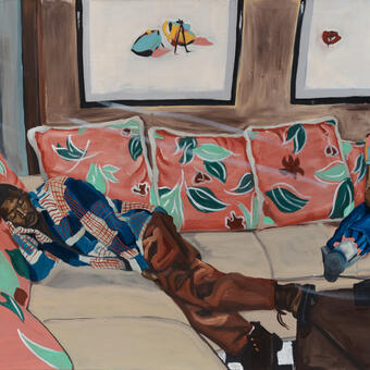 Boy and girl sitting on couch