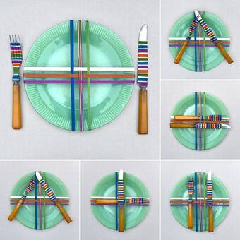 Weaving on a vintage kitchen plate, fork and knife using orange, purple, blue, green and cream colored Egyptian cotton, pearl cotton and cotton rug warp.