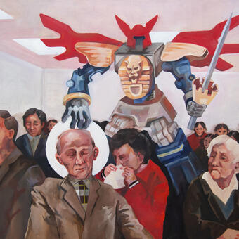 A crowd under a giant transformer