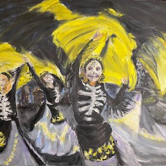 Four Day of the Dead dancers adorned in skeleton emblazoned outfits. As they are dancing they are sweeping yellow capes.