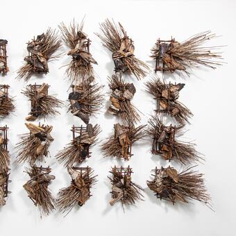 This is a wall hung 3-d work. Constructed from pine wood & willow.