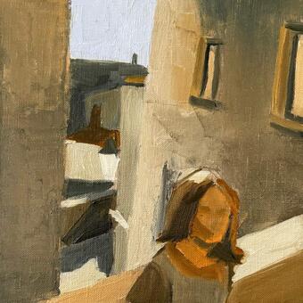 Young girl immersed in shadow and light amongst the corners and edges of medieval buildings in a Tuscan hilltown.