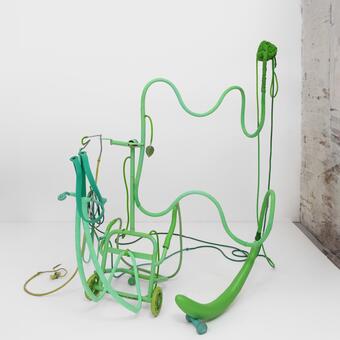 monochromatic green free standing sculpture