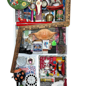 arrative found object assemblage wall-relief sculpture, 38 x 16.5 x 4, inspired by a lyric in the Joni Mitchell song "The Circle Game." Reflection on memories in this carousel of life. It features a child's Carousel record, Mickey Mouse, Cinderella, a child's clock, wishbone, old maid cards, gum parking spot, doll shoe, jump rope, Statue of Liberty figurine, pop beads and rosary beads, etc.