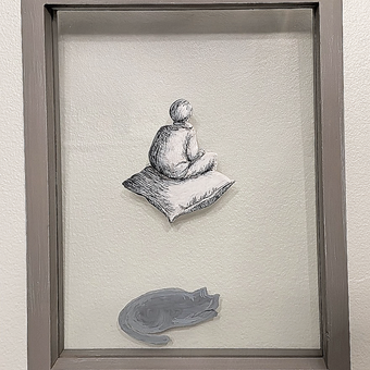 A framed minimalist artwork on a light background. At the center, a small monochrome figure sits cross-legged on a pillow, viewed from behind, rendered in fine line and soft shading. Below the figure, a simple gray silhouette of a curled sleeping cat floats near the bottom of the frame. The composition is quiet and spacious, emphasizing stillness, introspection, and rest.