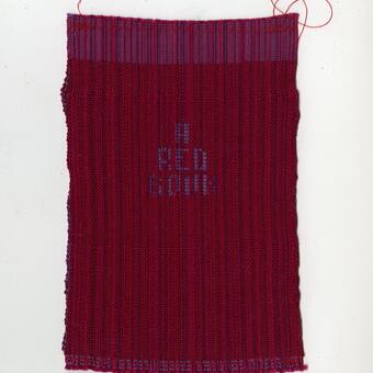 A red and purple weaving. Title reads: A RED BOOK.