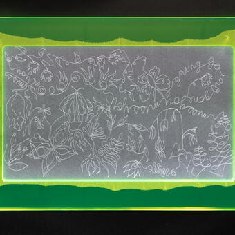 White lace matted between neon yellow plexiglass.