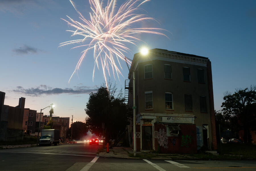 Fireworks burst in the air at an intersection in Upton.