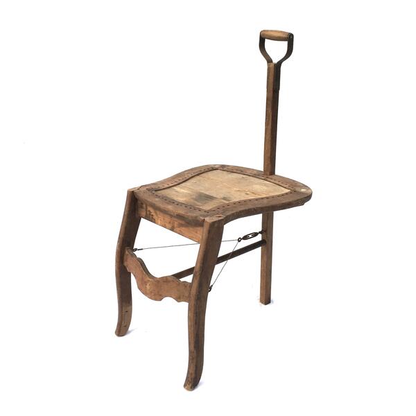 Three legged chair with handle