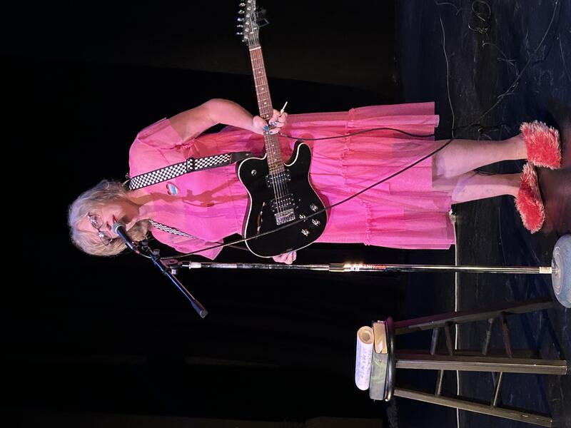 Performing music at the Charm City Kitty Club