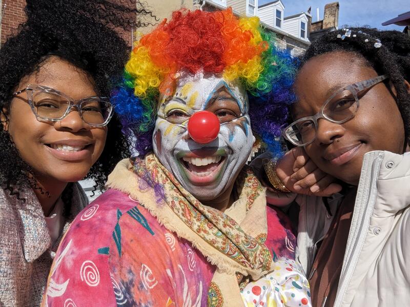 Sheila as the clown with daughter and Director, Nia Hampton