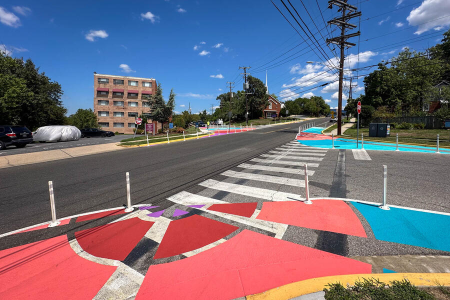 Rays of Peace, perspective view of intersection traffic calming pavement art