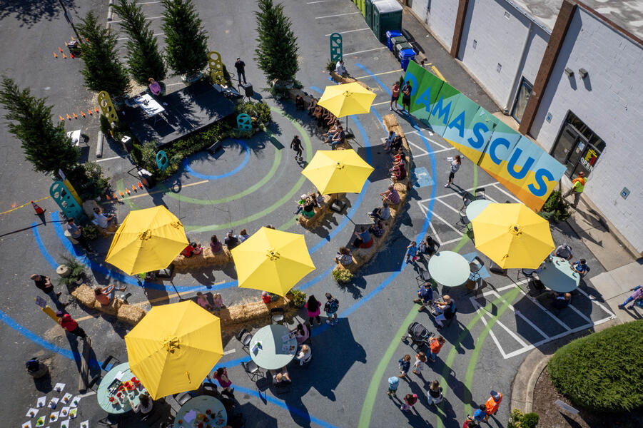 Damascus Placemaking Festival, Amphitheater of hay bales, pavement art and mural board, birds-eye view