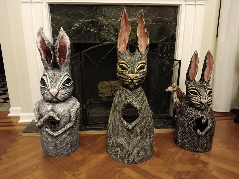 Gathering of Large Votive Rabbits in Front of the Fireplace