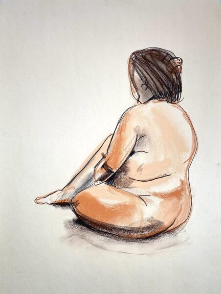 Seated woman in tan