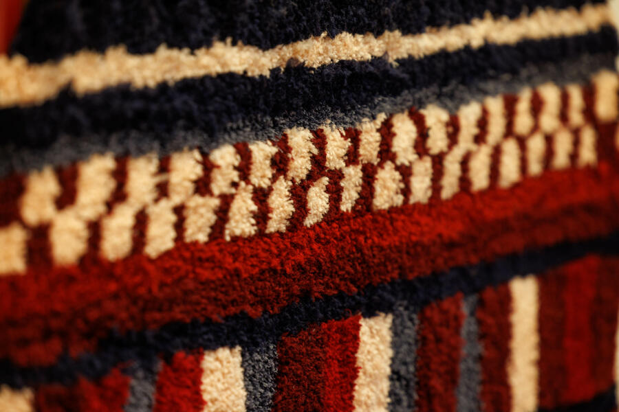 how stunningly beautiful that our sacred respect for earth, for life is deeper than our rage (Portrait of Salua Moussawel) Rug Detail