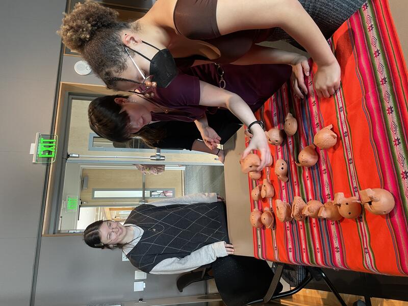 Students get their clay flutes back from firing