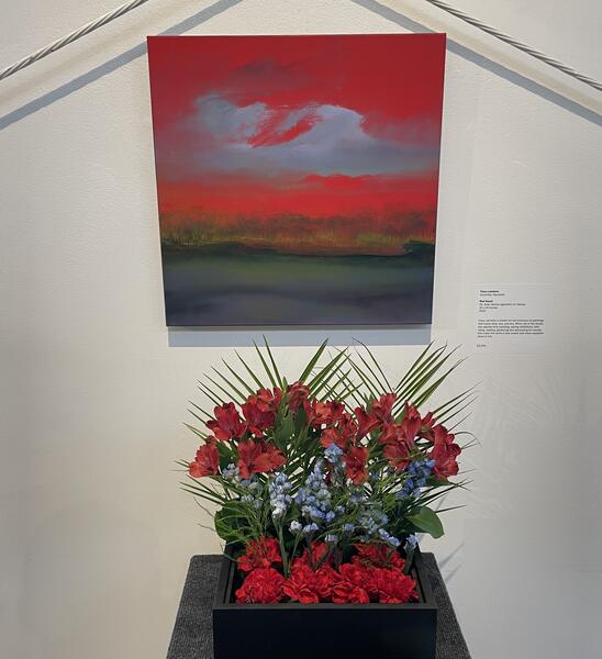 Red Kauai with floral arrangement inspired by the painting