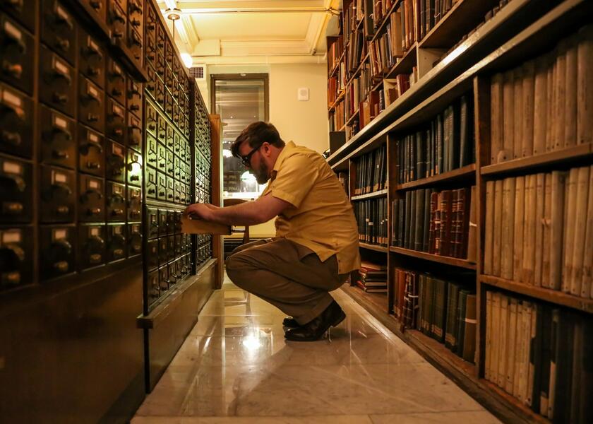 Josh Aterovis searching the card catalog in See Also