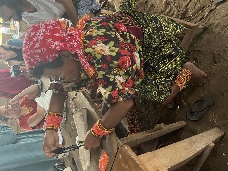 Women winny (beaded record keeping) making